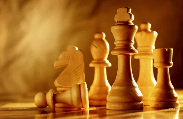 Chess pieces in light wood — Stock Photo, Image