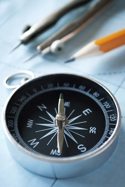 Compass and pencil on a map — Stock Photo, Image