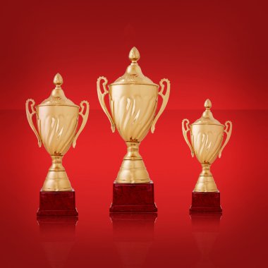 parlak sarı zemin üzerinde üç Altın Kupa