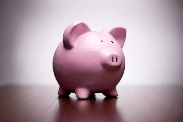 Piggy bank rosa com vinheta — Fotografia de Stock