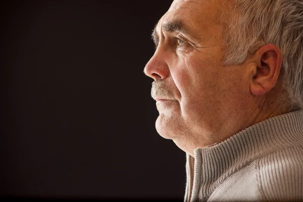 Beautiful portrait of a pensive senior man — Stock Photo, Image