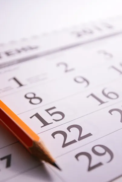 Close-up of a pencil on the page of a calendar — Stock Photo, Image