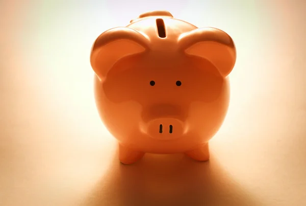 Backlit pink piggy bank Royalty Free Stock Images