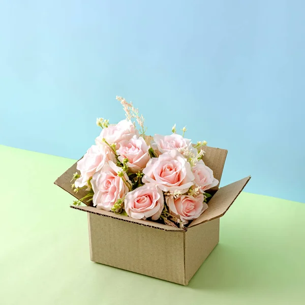 Flowers Pink Roses Cardboard Delivery Box Pastel Background Idea Delivery — стоковое фото