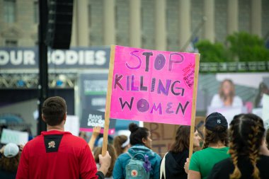 Protesters gather for the 