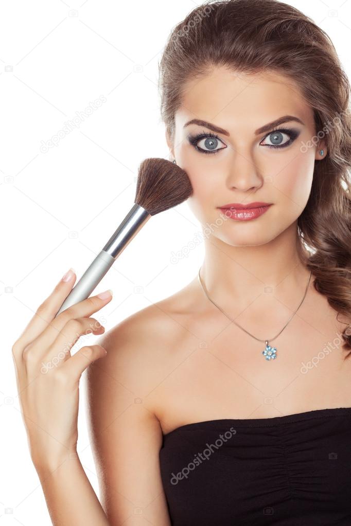 Woman with a make-up brush