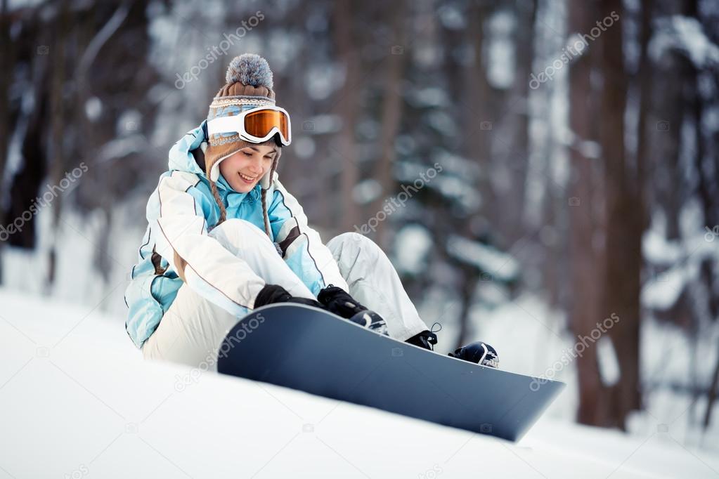 Young woman strapping in