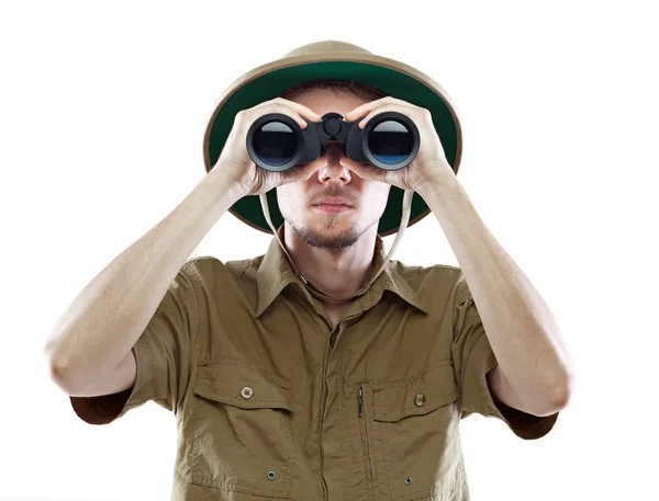 Explorer looking through binoculars — Stock Photo, Image