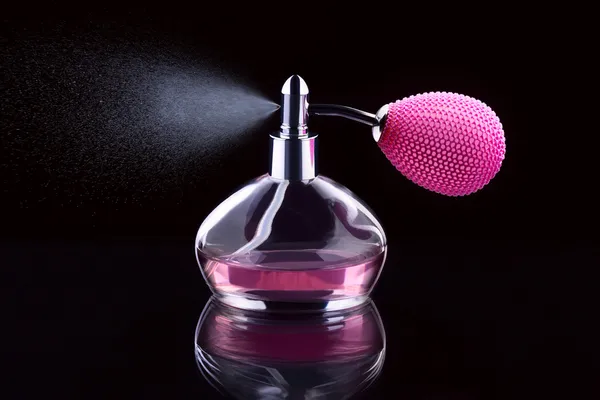 Spraying perfume — Stock Photo, Image