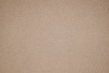 Kalıplı yüzeyi olan yoğun bir endüstriyel kağıt tabakası.