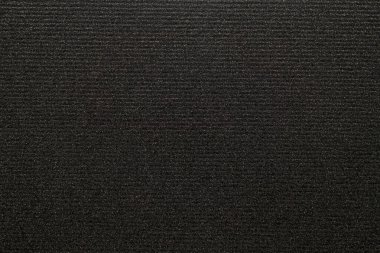 Kalıplı yüzeyi olan yoğun bir sanayi kağıdı.