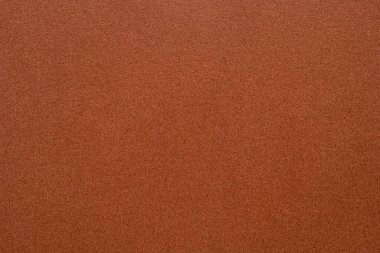 Kalıplı yüzeyi olan yoğun bir sanayi kağıdı.