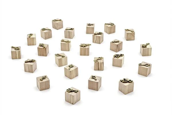 Bronze Ornamental Keys Wooden Toy Cubes White Background — Stock Photo, Image