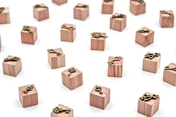 Bronze Ornamental Keys Wooden Toy Cubes White Background — Stock Photo, Image