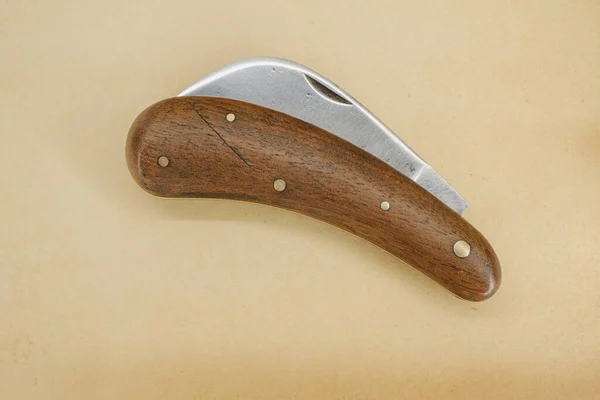 Folding Pruning Knife Curved Long Blade Vintage Paper Background — Stok fotoğraf