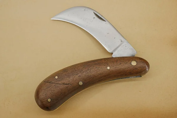 Folding Pruning Knife Curved Long Blade Vintage Paper Background — Stok fotoğraf