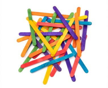 Popsicle sticks of various colors are stacked on top of each other