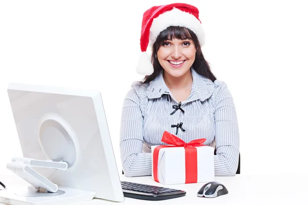 Freundliche Geschäftsfrau mit Weihnachtsmann-Hut — Stockfoto