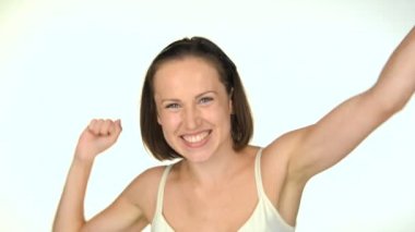 Woman rejoicing and clapping in hands