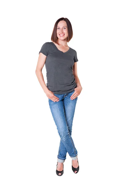 Smiley slim girl in the t-shirt and jeans Royalty Free Stock Images