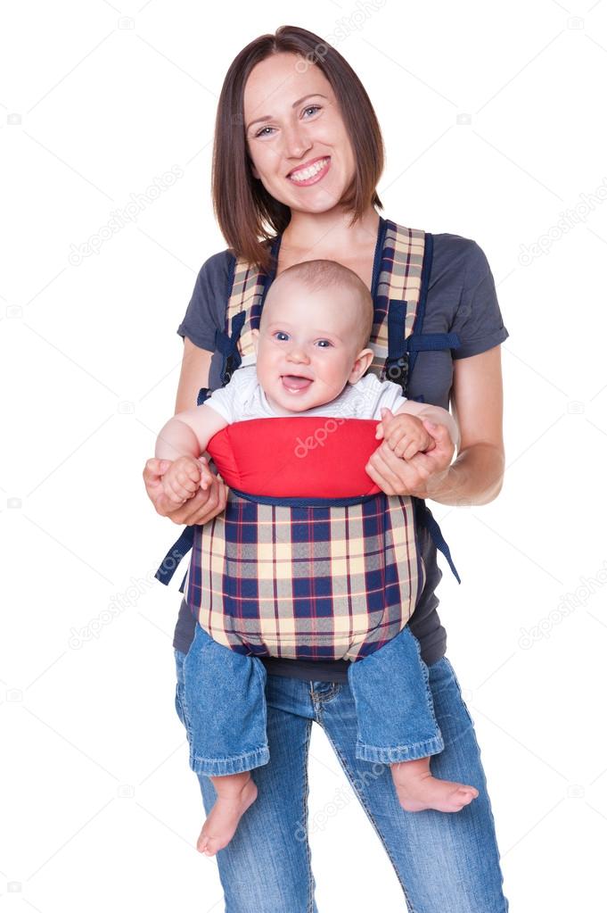mother holding her baby in the knapsack