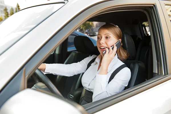 Businesswoman driving the car — Stock Photo, Image