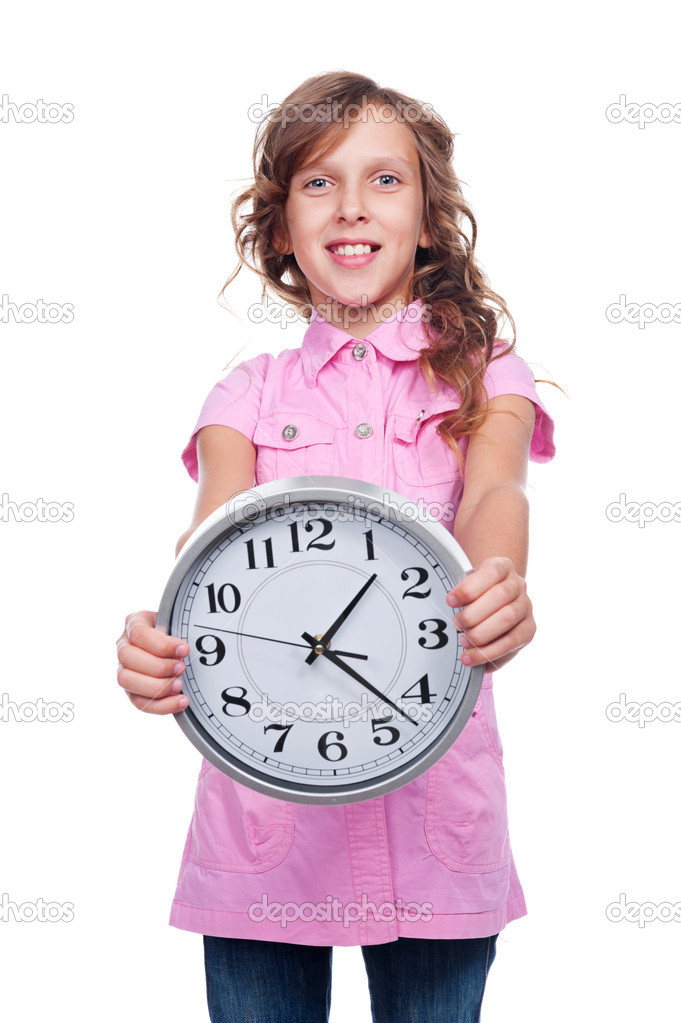 girl holding the clock and smiling