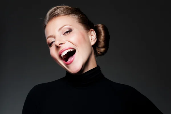 Studio shot of happy young woman — Stock Photo, Image