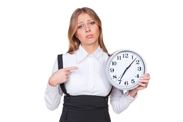 Businesswoman pointing at the clock — Stock Photo, Image