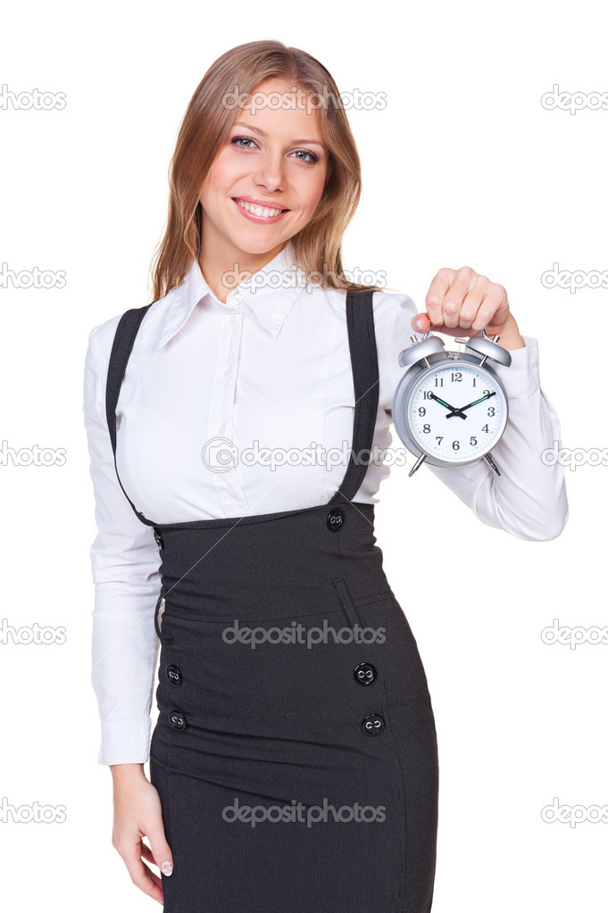businesswoman holding alarm clock