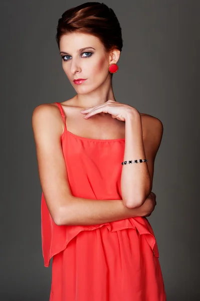 Alluring female in red dress — Stock Photo, Image