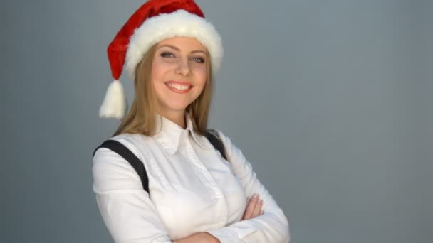 Joyful businesswoman in santa hat — Stock Video