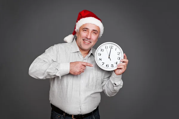 Man pointing at the clock — Stock Photo, Image