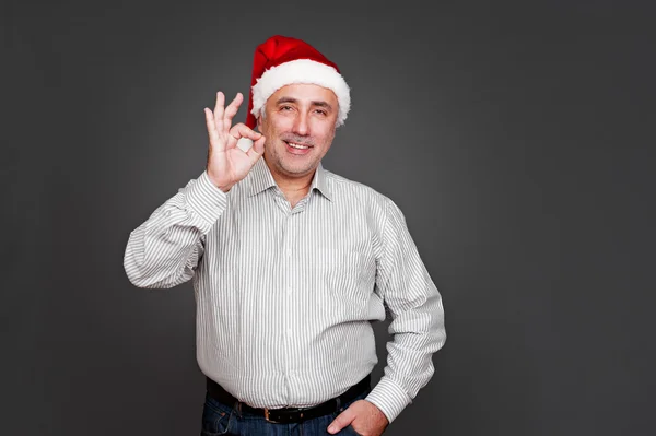 Uomo di Natale mostrando segno ok — Foto Stock