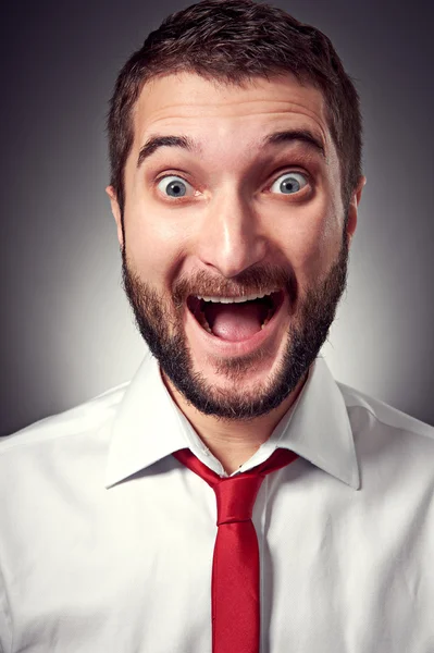 Excited young man with beard — Stock Photo, Image