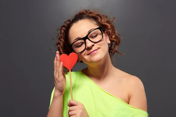 Woman in funny glasses with paper heart Royalty Free Stock Photos