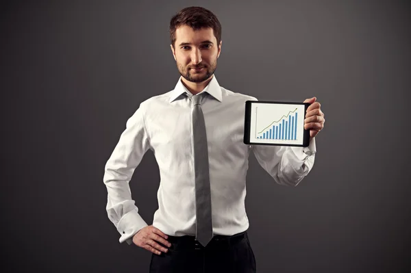 Hombre mostrando gráfico de crecimiento —  Fotos de Stock