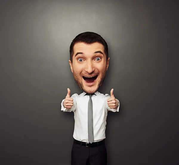 Hombre de negocios feliz con la cabeza grande riendo Fotos de stock libres de derechos