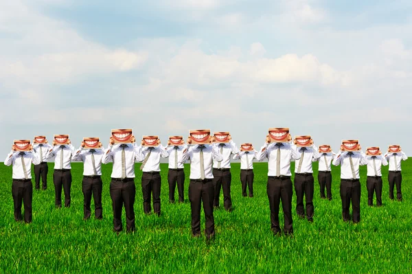 Empresários segurando grandes sorrisos — Fotografia de Stock