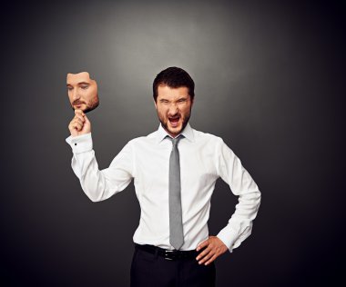 irate man holding mask clipart