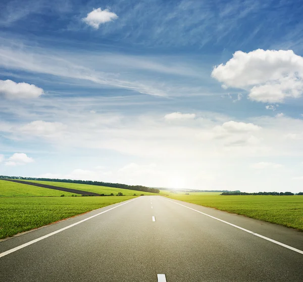 Meadow and speedway — Stock Photo, Image