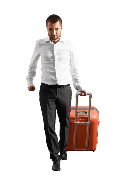 Confident businessman with suitcase — Stock Photo, Image