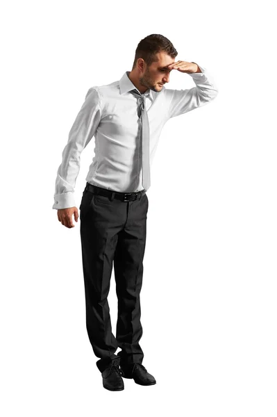 Man standing and looking down — Stock Photo, Image