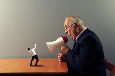 boss screaming at small businessman clipart