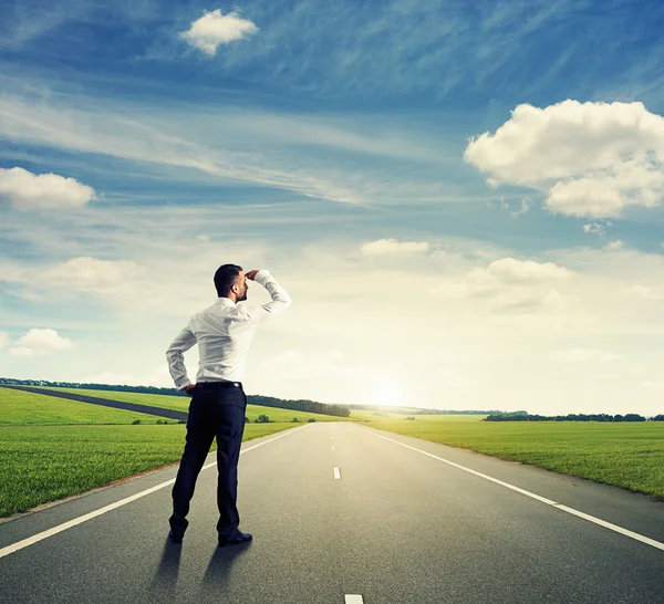 Businessman on road — Stock Photo, Image