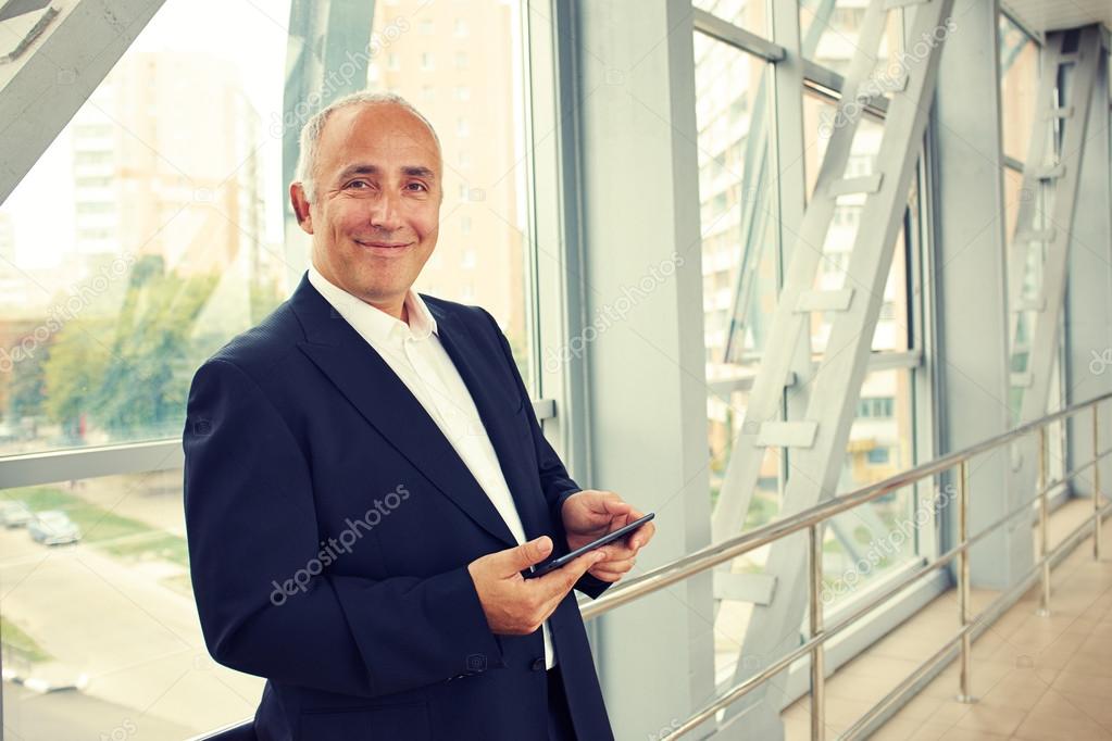 man holding tablet pc