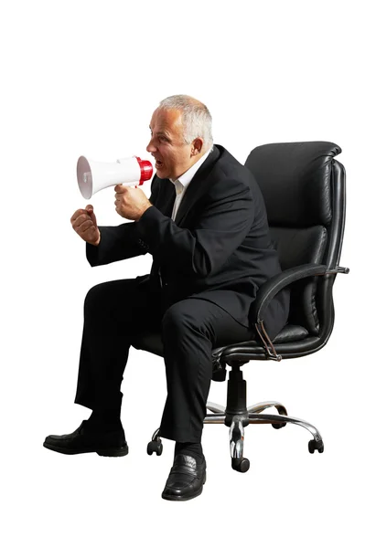 Angry senior boss screaming at megaphone — Stock Photo, Image