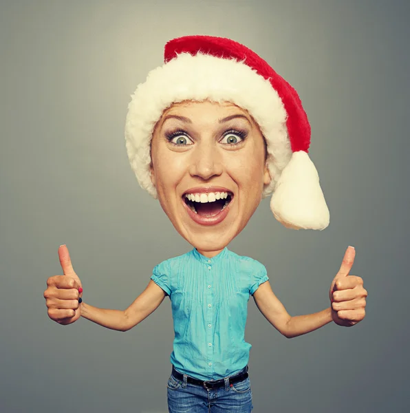 Girl in red hat showing thumbs up — Stock Photo, Image