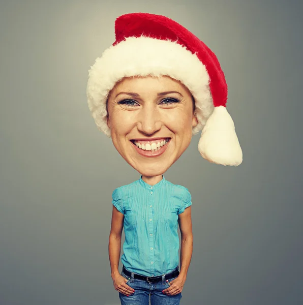 Smiley-Mädchen mit Weihnachtsmann-Hut — Stockfoto