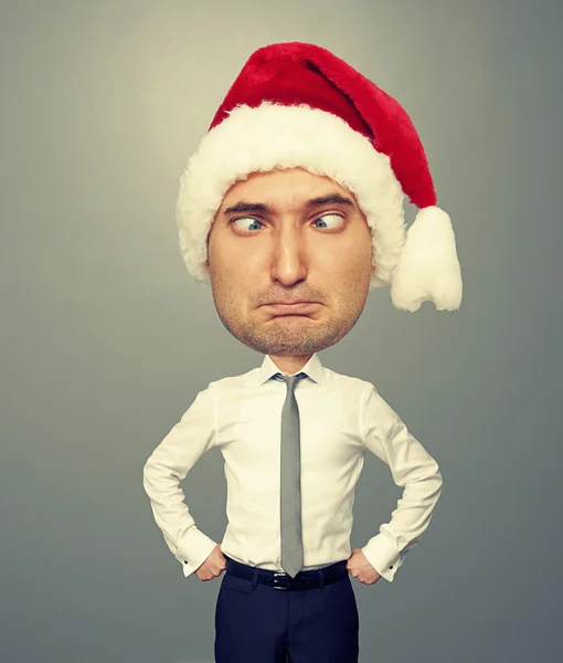Grappige christmas mens in rode kerstmuts — Stockfoto